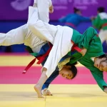 Pertarungan dua pegulat kurash. Foto: cgtn.com