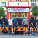 Tim gabungan dari Satuan Reskrim Polres Aceh Utara dan jajaran Polsek menangkap 14 pejudi online. Foto: Dok. Humas Polres Aceh Utara