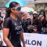 Atlet Triathlon Aceh, Renata Berliana Aditya meraih emas di nomor Sprint Distance Aquathlon Putri di Dermaga Alfitrah, Takengon, Aceh Tengah, Minggu (15/9/2024).Foto: RRI/Fitra Jay