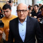 S Iswaran saat tiba di Pengadilan Singapura. Foto: Reuters