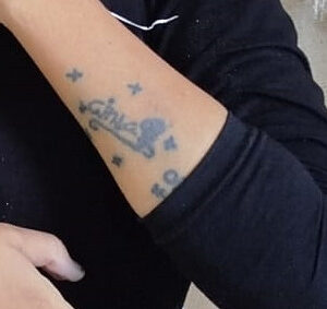 Tato di tangan Cinta