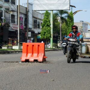 Jalan Pase berlubang 15 Mei 26