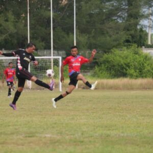 Kapten JPFC menendang bola saat lawan BI FC