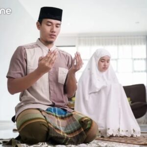 Ilustrasi suami istri sedang beribadah
